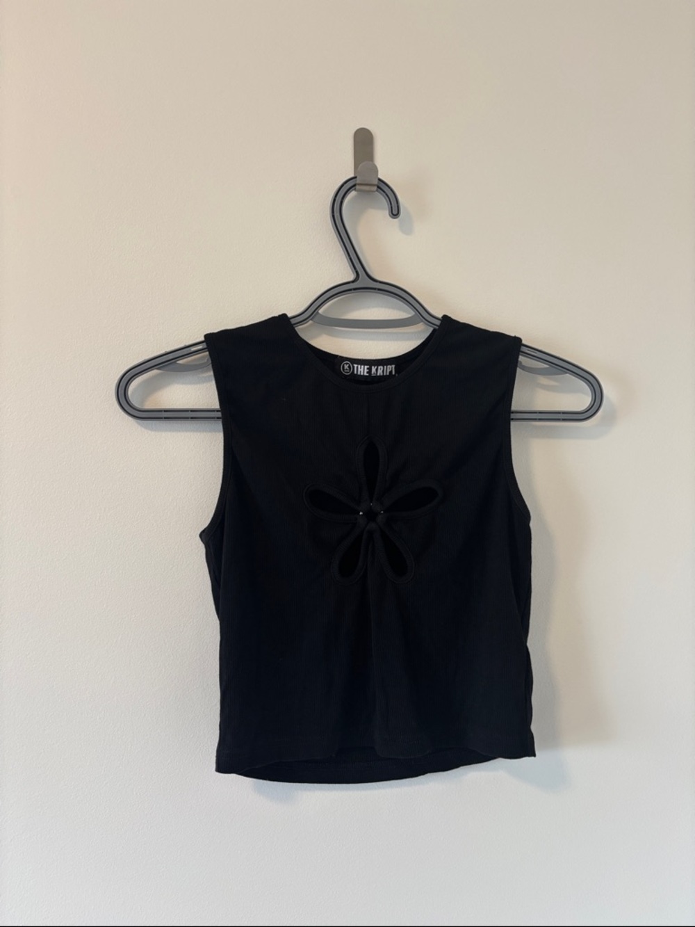 The Kript Women's Black Sleeveless Cutout Flower Tank